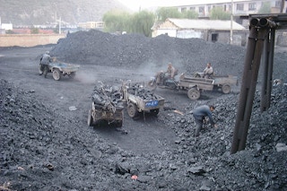Coal miners at Lao Ye Temple Mine in Shanxi, China