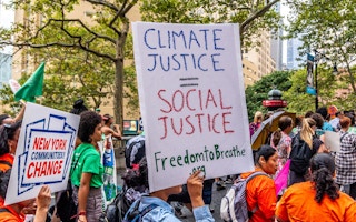 climate justice is social justice sign