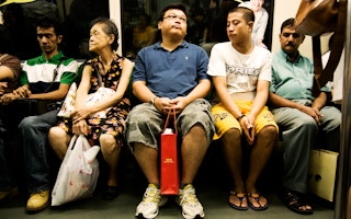 Singaporeans on the MRT