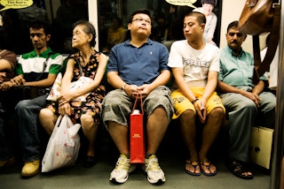 Singaporeans on the MRT