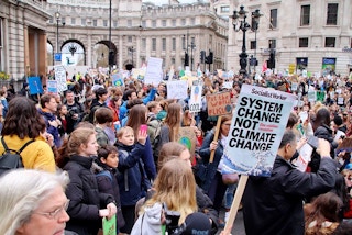 system change climate protest 