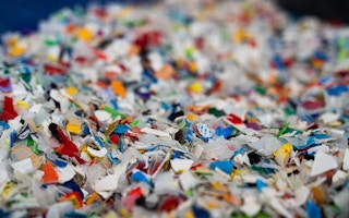 Shredded recycled plastic pieces
