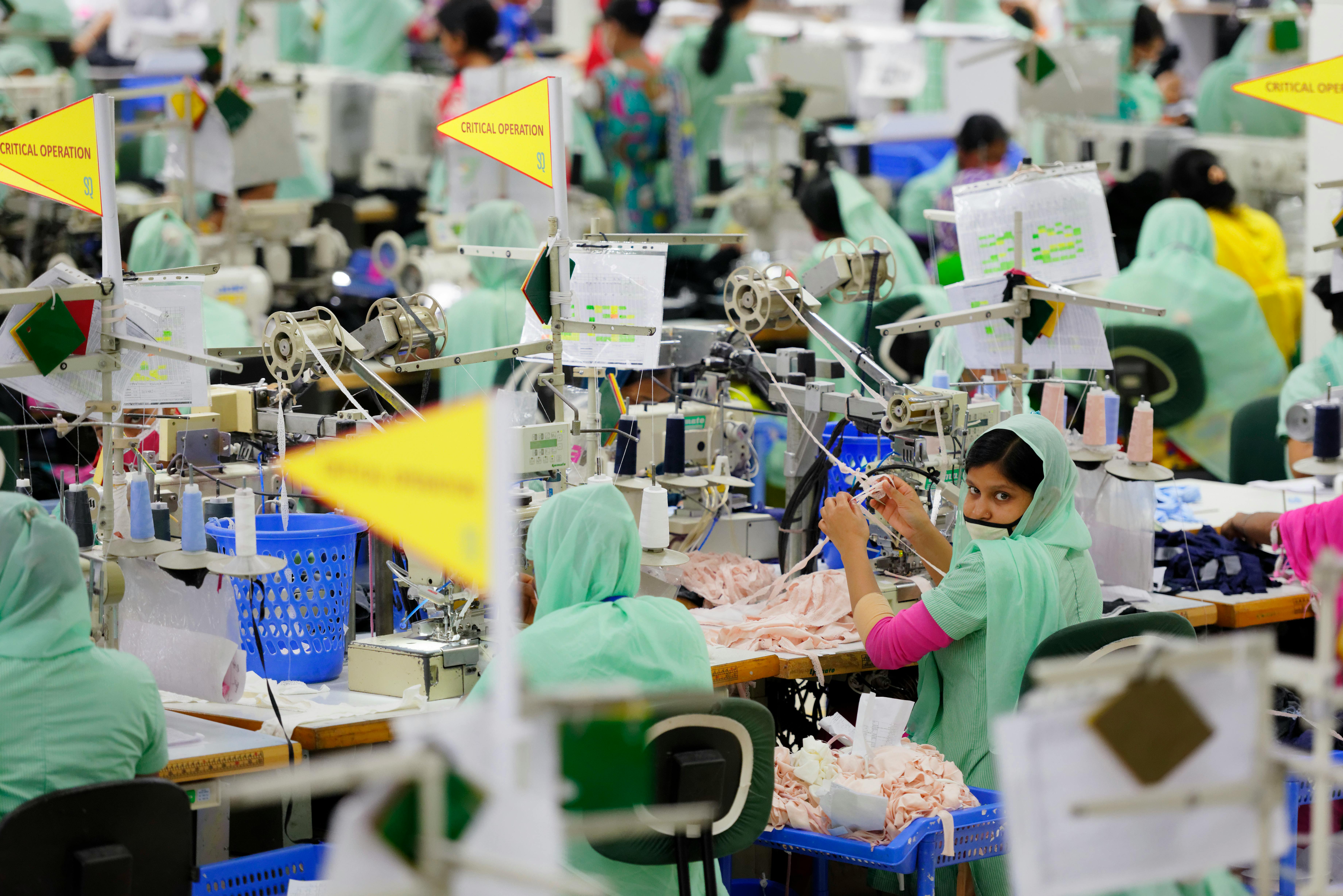 Tailors working in a local garment factory in Bangladesh