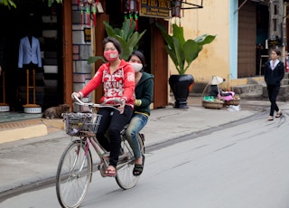 Young women cycling in Vietnam