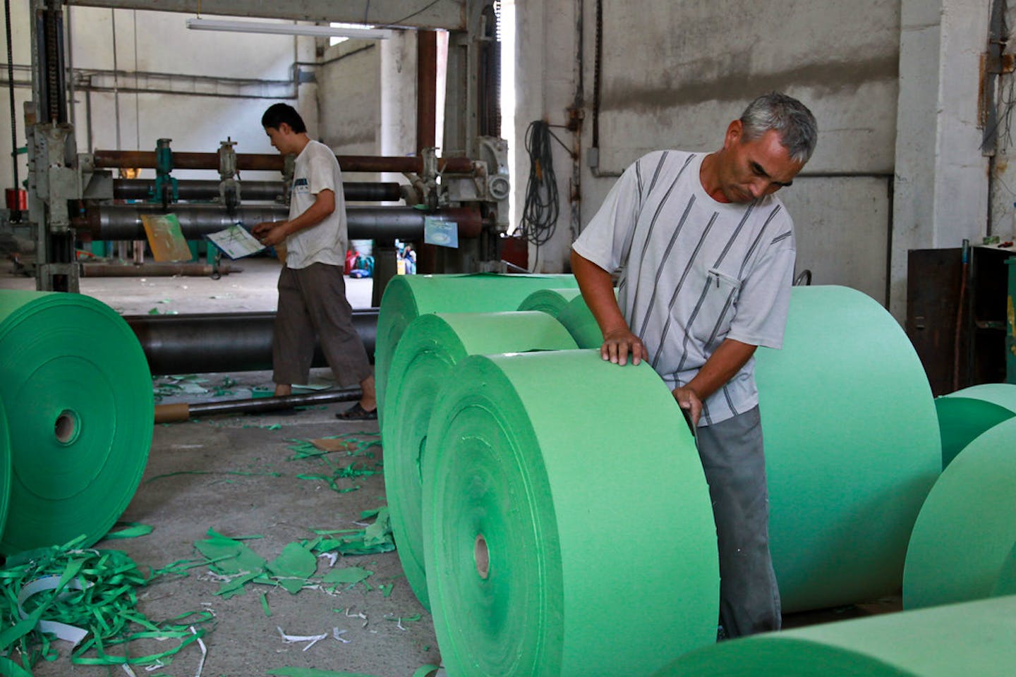 Workers in a waste paper processing factory in Uzbekistan