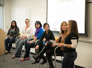 Women on a panel on women in tech