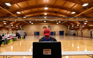 A voter casts his ballot for the midterm primary election in Grove City, Ohio, U.S. May 3, 2022.