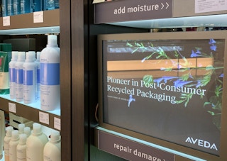 Aveda products, promoted as using post-consumer recycled plastic.