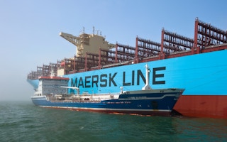 Shipping containers are transported on a Maersk Line vessel in Russia