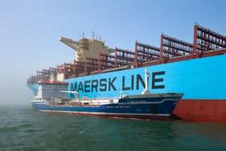 Shipping containers are transported on a Maersk Line vessel in Russia