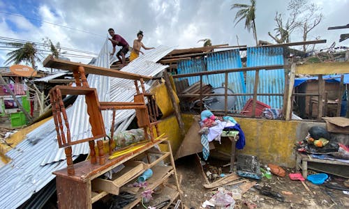 In pictures: Typhoon Rai's deadly path through the Philippines