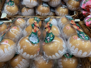 Heavily packaged fruit in a supermarket in Singapore.