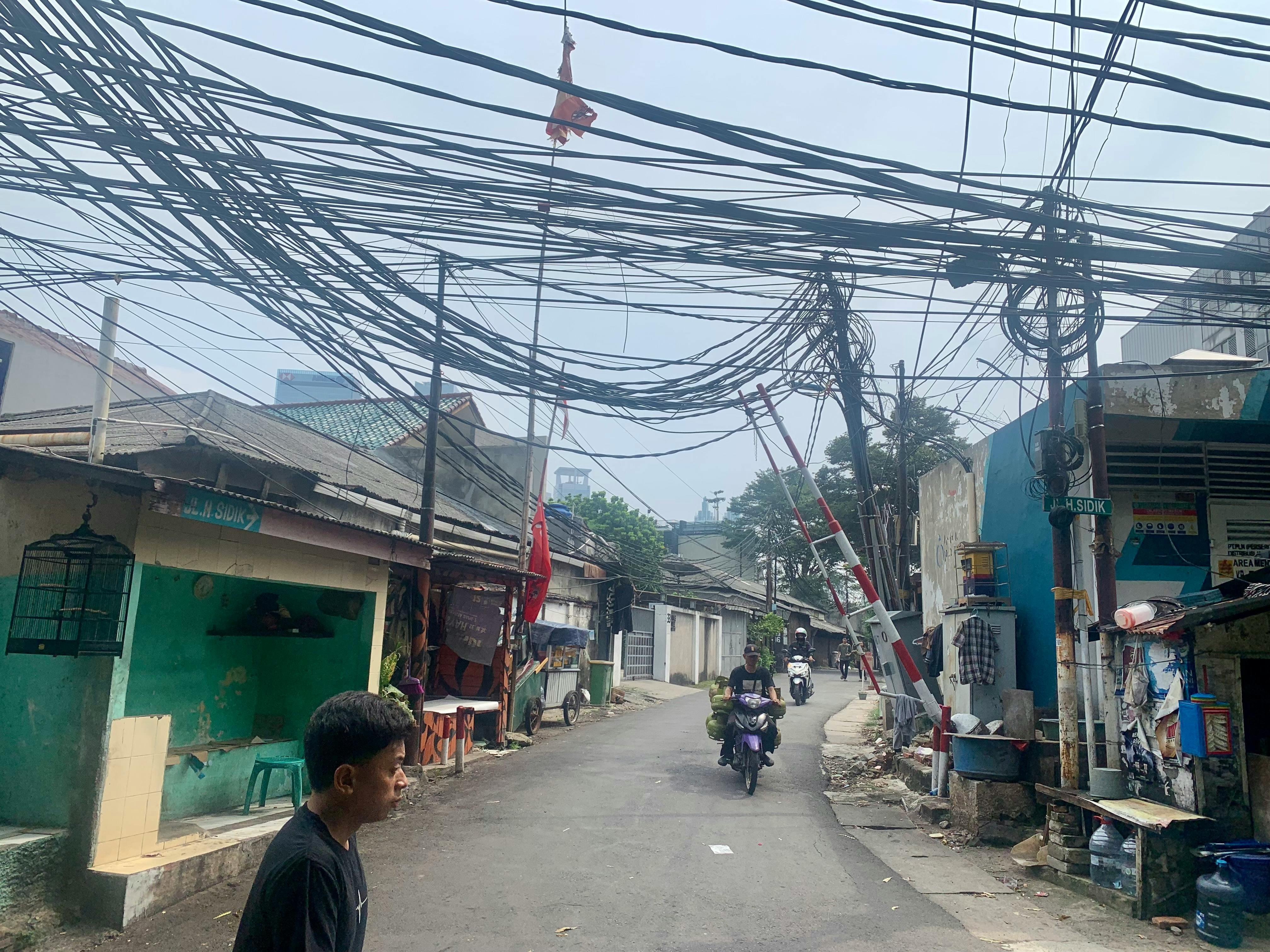 A street in South Jakarta, with exposed electrical infrastructure