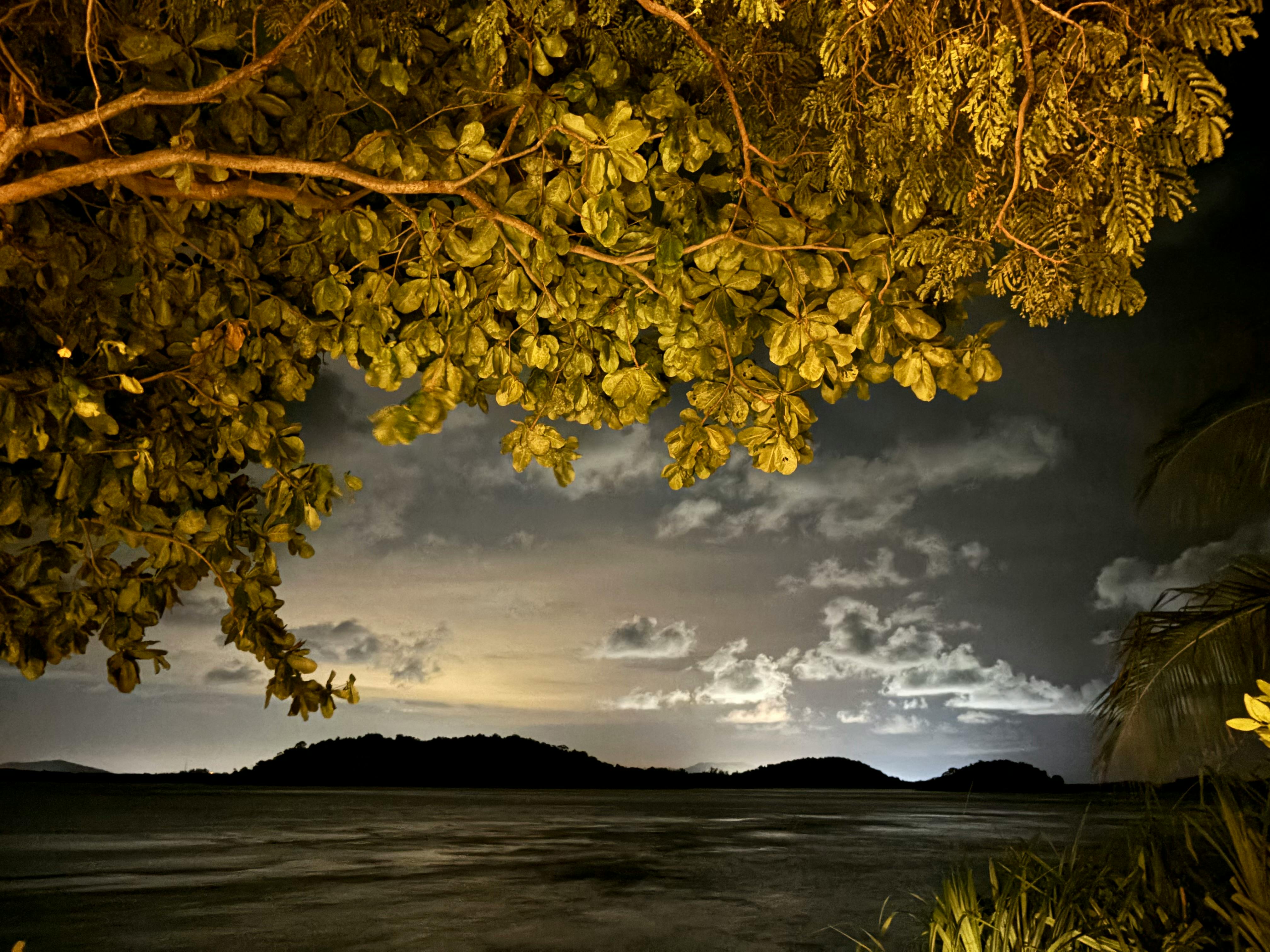 The view of Pulau Poto from Cempedak, with PT BAI's aluminium processing complex over the horizon. Image: Robin Hicks / Eco-Business