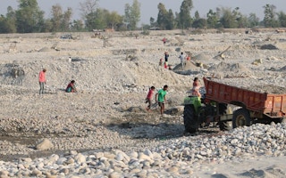 labourers in Nepal river