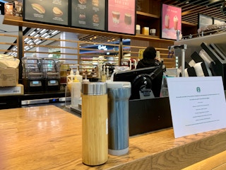 Reuseable drink containers at a Starbucks outlet in Singapore, where BYO is still allowed. Starbucks has banned BYO in some countries, but not in others. Image: Eco-Business