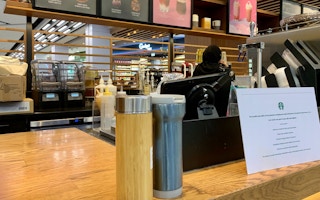 Reuseable drink containers at a Starbucks store in Singapore.