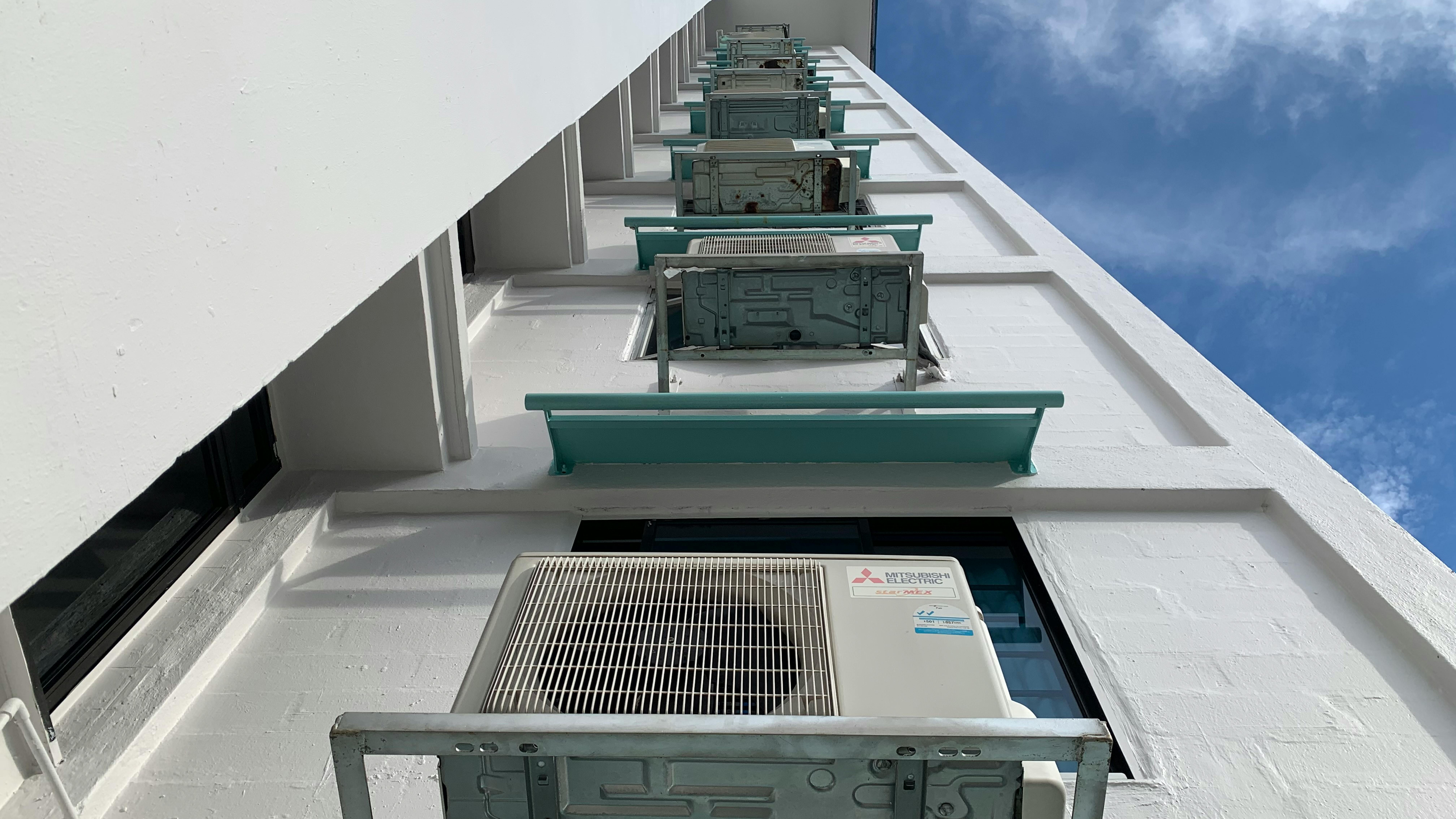 Air-conditioning units on a building in Singapore. Image: Robin Hicks/Eco-Business