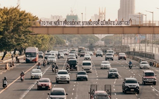banner calling for the incoming administration to prioritise climate justice