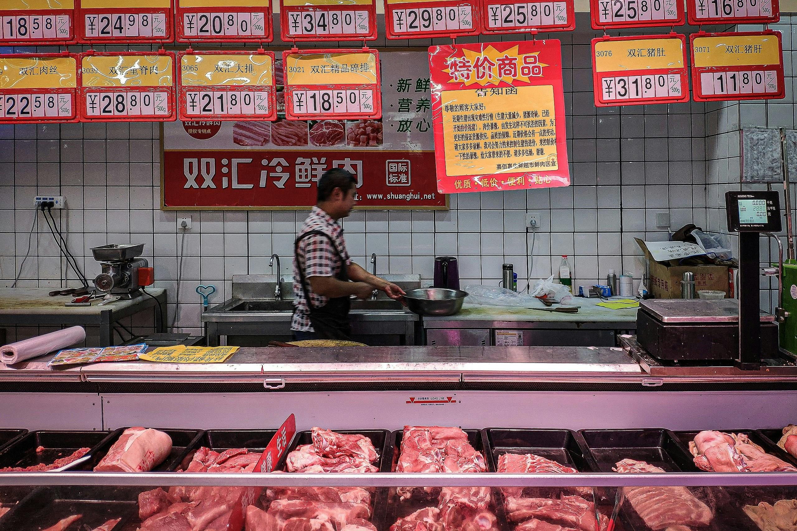 Market selling pork in China