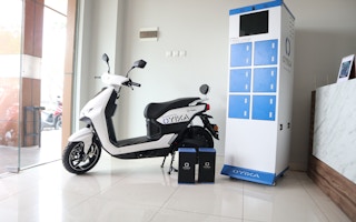 Oyika's electric motorbike in a battery swap station.