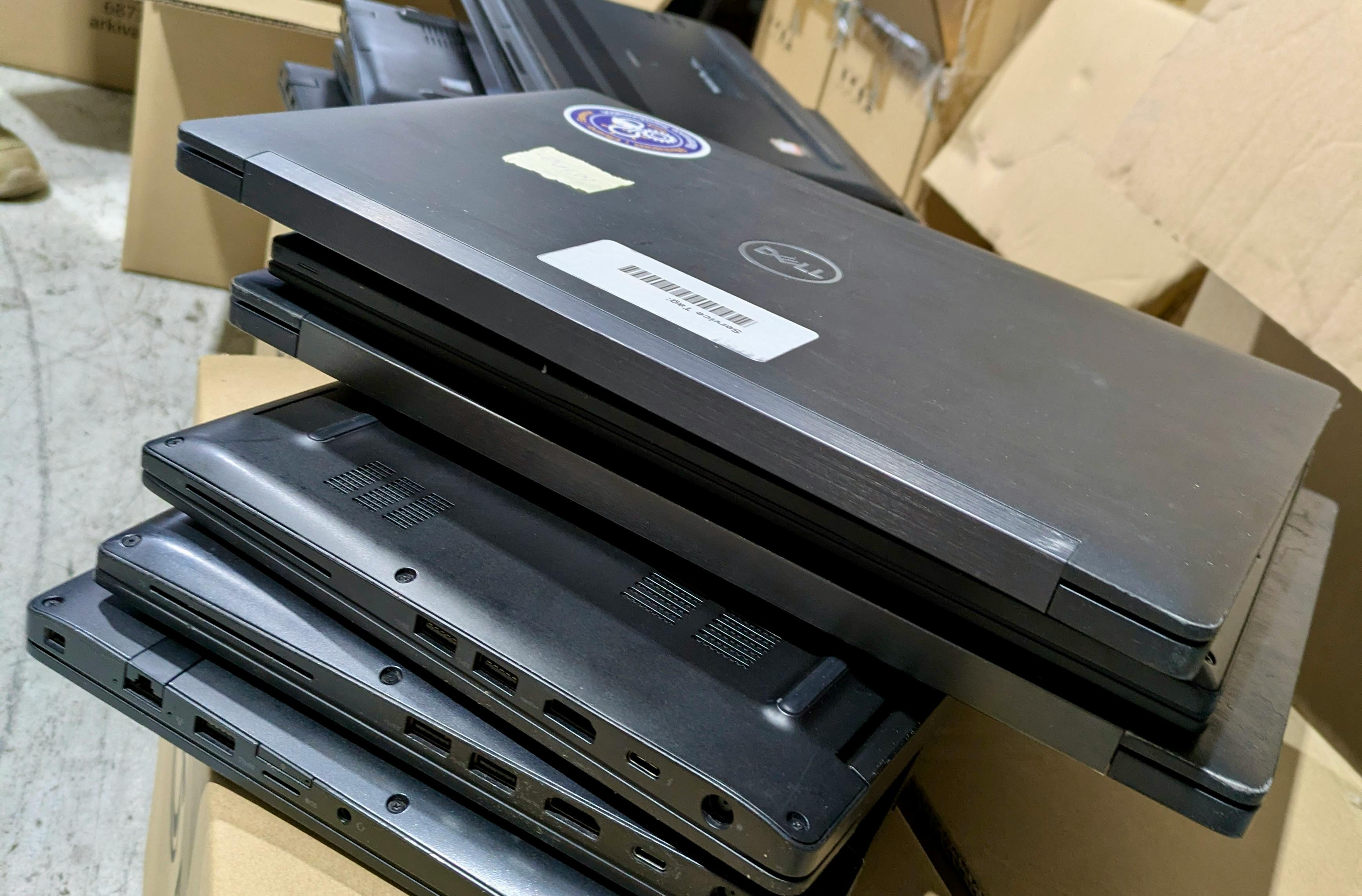 used laptops in a warehouse in Singapore