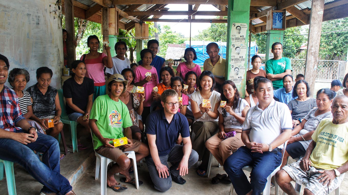 Tan visiting rice farmers in the Philippines in 2013. Image: Cherie Tan