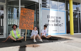 Extinction Rebellion protesters demonstrate outside of the News Corp headquarters in Bowen Hills, Brisbane, where they deposited a truckload of manure. The protesters held banners that read: "Billionaire liars. Media monopoly. Climate denial. We call bullshit." Image: XR