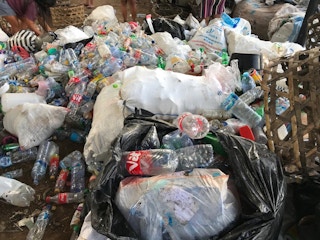 Plastic awaits recycling in Bali, Indonesia. Image: Alvaro Aguilar