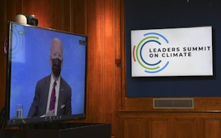 US President Joe Biden on the screen for Leaders Summit on Climate