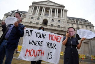 activists protest climate finance