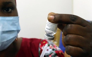 Nurse administering vaccine