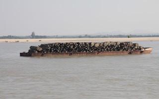 Teak Logs, Irrawaddy River, Mandalay, Myanmar, 2011