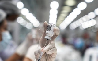 Vaccine dose being prepared in Thailand
