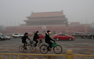 cyclists at tiananmen gate
