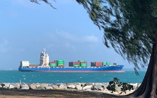 Ship passes off the coast of Singapore
