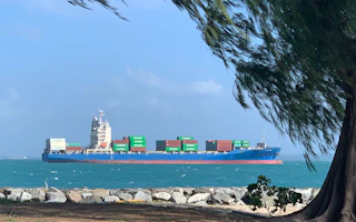 Ship passes off the coast of Singapore