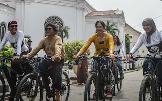 Cyclists on the road to Bali