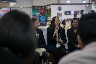 Kate Yeo addressing Singapore's environment minister Grace Fu at the COP27 climate talks. Image: Kate Yeo