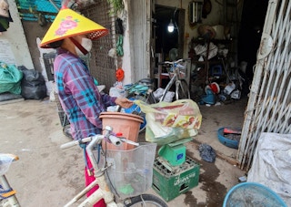 A waste picker at work in Vietnam