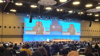 Conference co-chair Nabeel Munir addresses delegates at the SB 58 Opening Plenary. Image: Kate Yeo