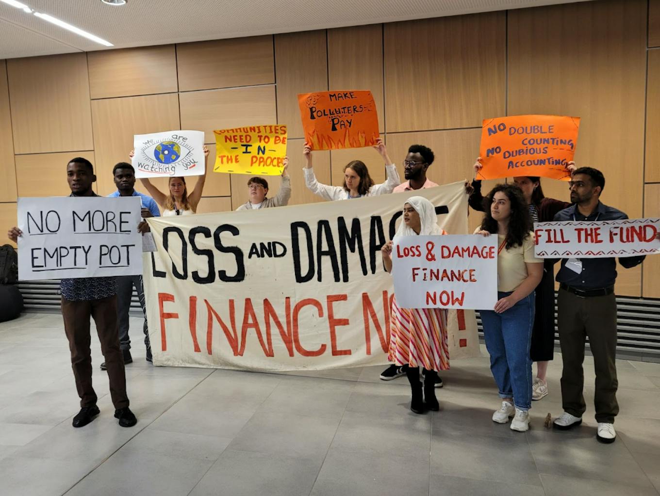 Youth activists call for more urgent Loss and Damage funding. Image: Kate Yeo
