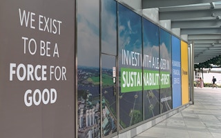 An outdoor billboard promoting Maybank