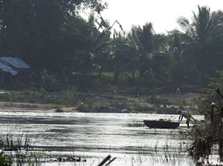 Fisherman work the Bhavani river in Tamil Nadhu.