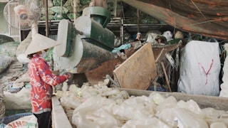 Plastic bottles in Vietnam informal waste recycling facility