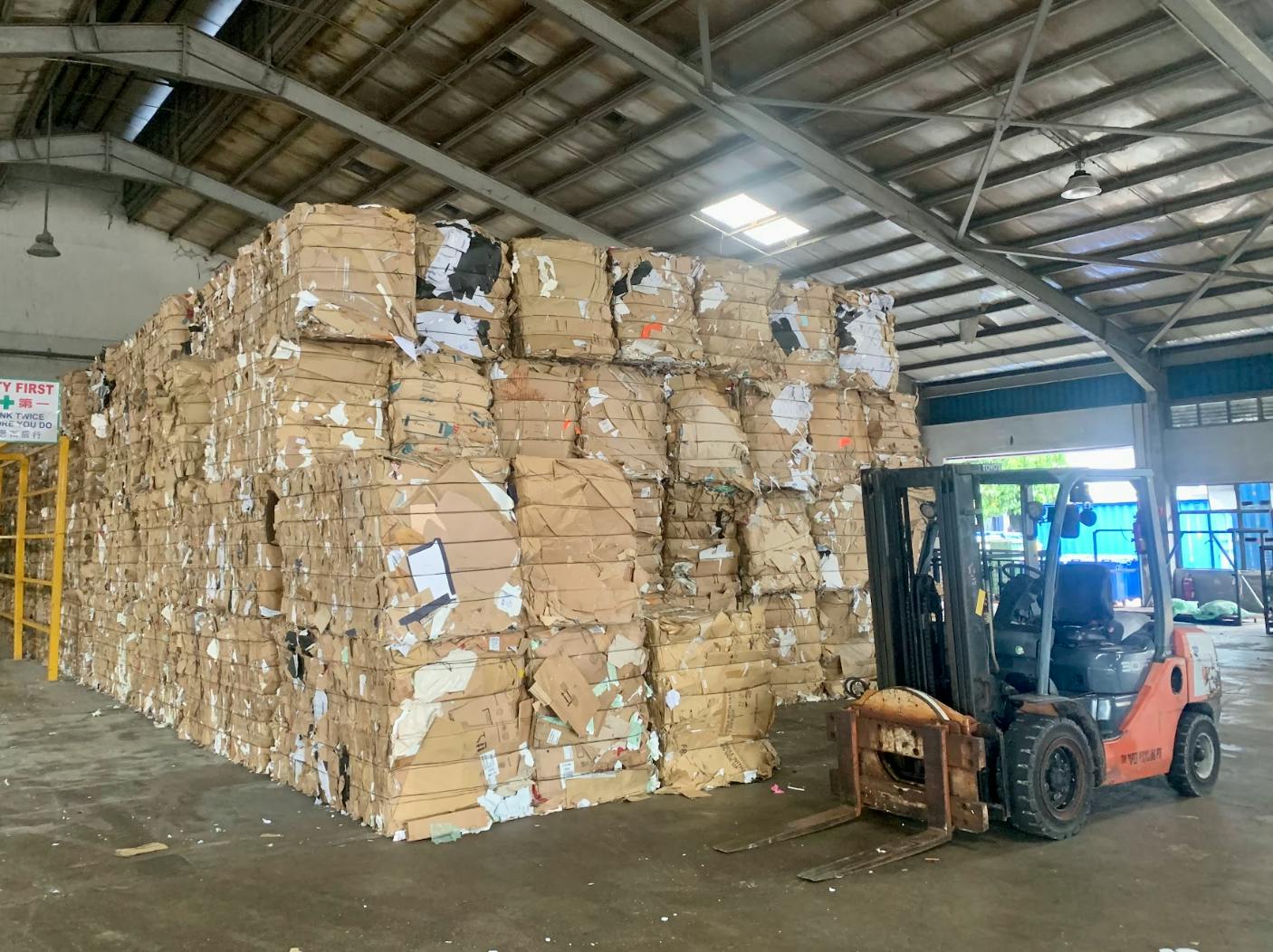 Bails of paper await processing at Tay Paper Recycling's facility in Tuas, western Singapiore.