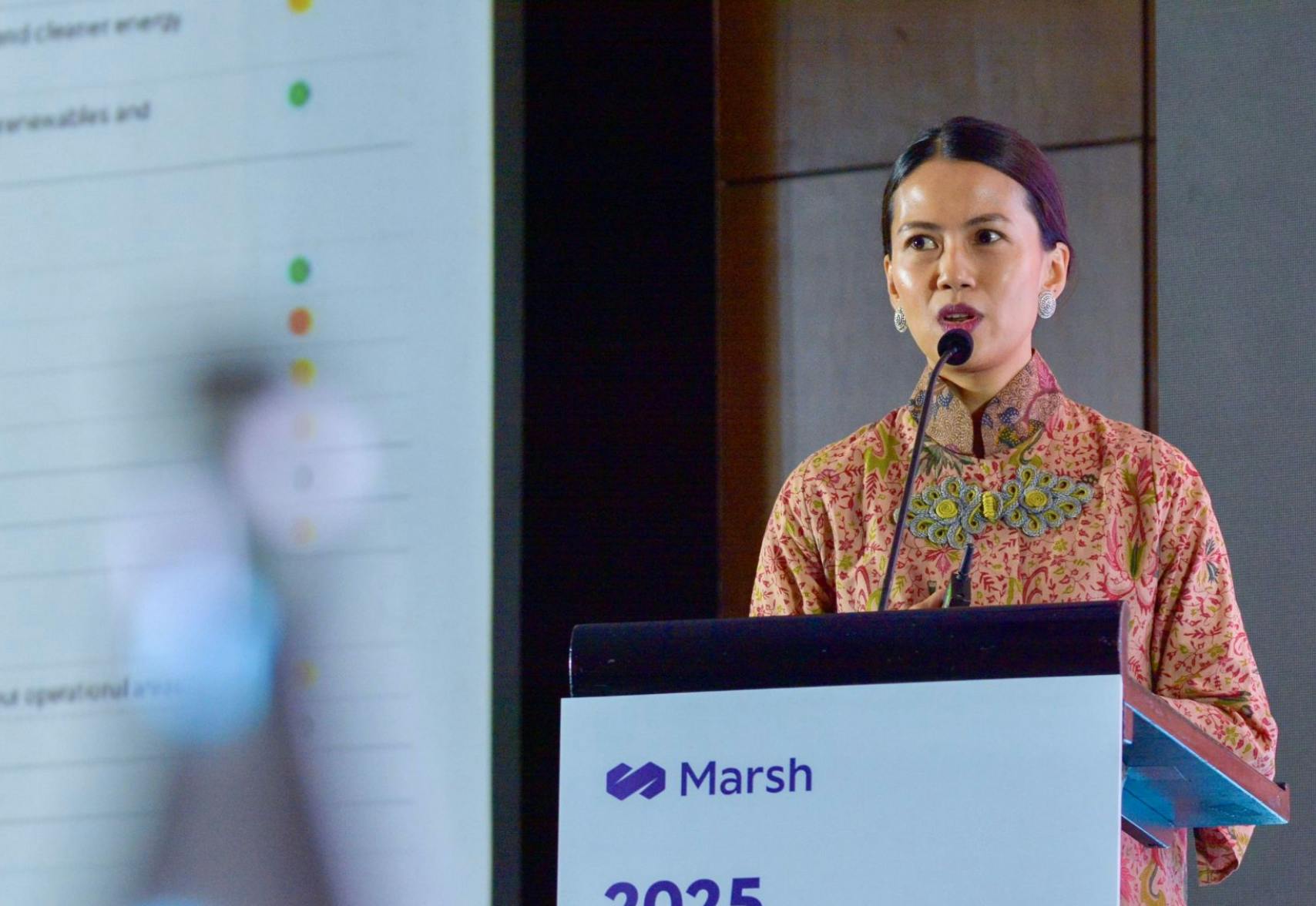 Nadine Zamira Syarief speaking at the Indonesia Risk Forum on behalf of APRIL, where she was senior sustainability and risk manager