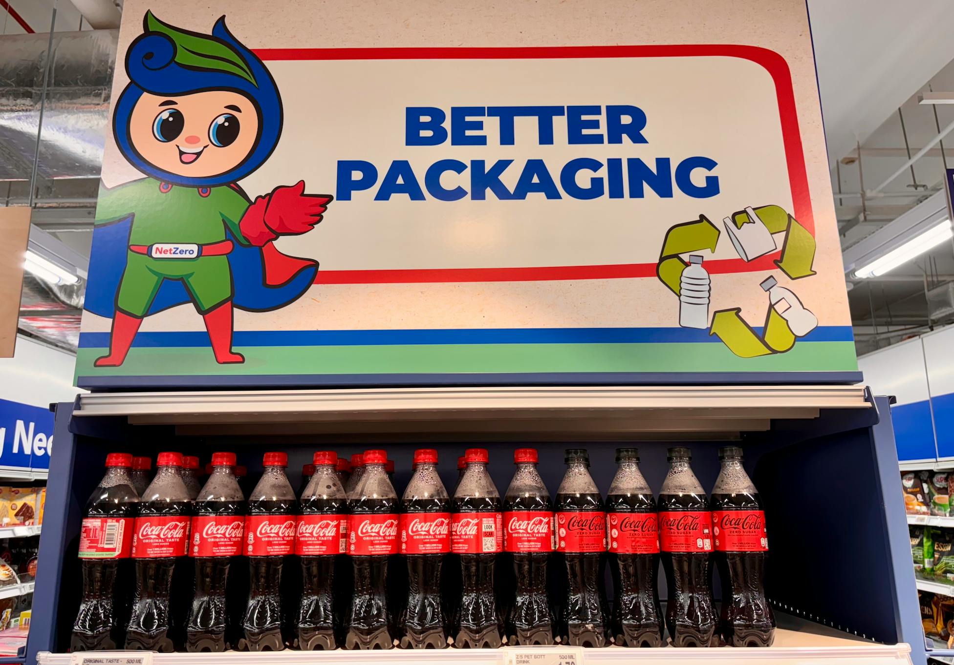 Coca-Cola stacked on shelves in NTUC Fairprice in Singapore