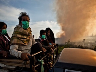 smoke from peatland riau indonesia