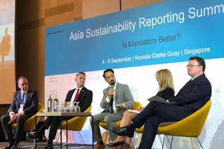 CSRWorks managing director Rajesh Chhabara (centre) sits in between Tim Mohin of GRI and Madelyn Antoncic of SASB at the Asia Sustainability Reporting Summit. Mohin and Antoncic clashed over whose standard was better. Image: Eco-Business